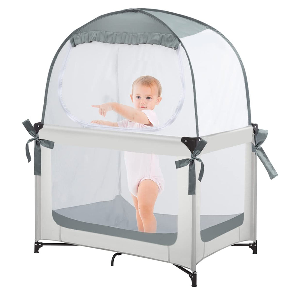 L RUNNZER baby pack n play tent in a crib, providing safety and visibility.