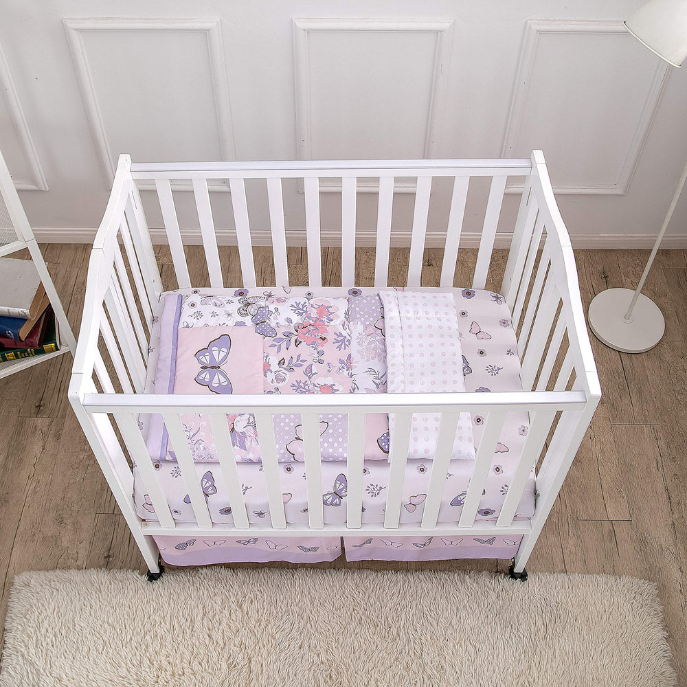 La Premura pastel butterfly quilt showcases vibrant colors for a cozy nursery focal point.