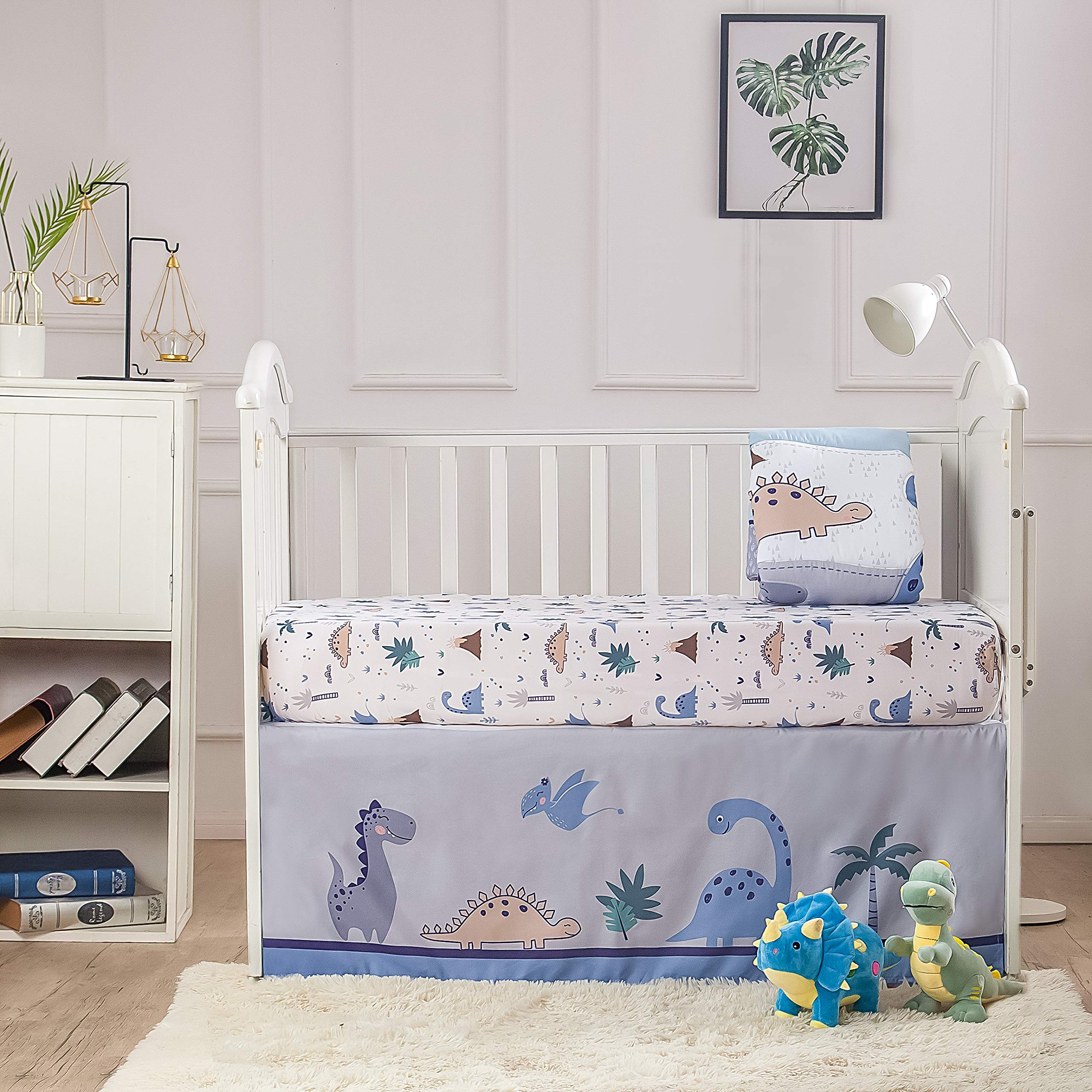 La Premura grey blue dinosaur bedding set in neutral unisex tones.