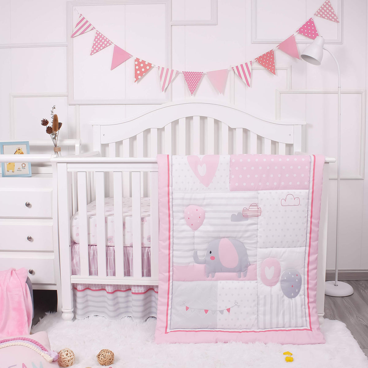 La Premura pink elephant balloons crib sheet offers ultra-soft comfort for peaceful naps.