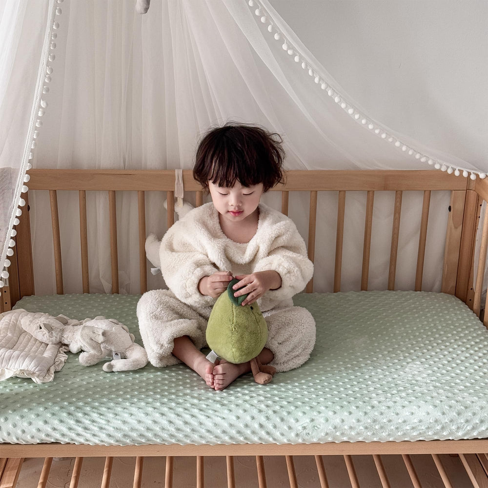 La Sheer crib sheet elastic-8in-pocket ensures secure fit during restless nights.