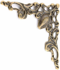 Labriciyon antique bronze corner protector on a photo album frame adds vintage charm and protection.