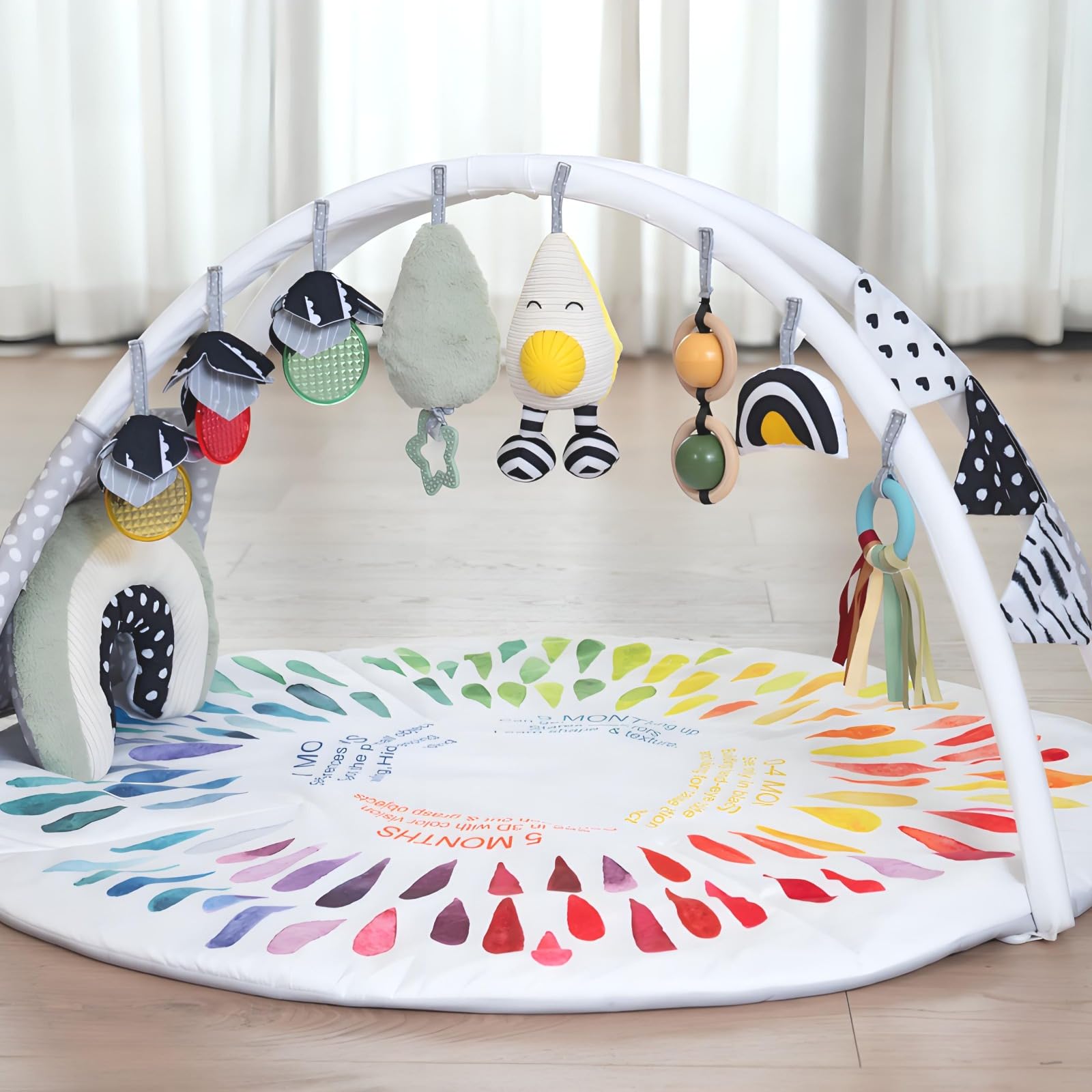 Interchangeable rings can be hung on cribs or strollers for versatility.
