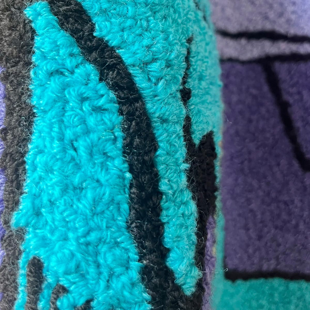 LAKEA Enthusiast racing-car rug embroidered center adds vibrant focal point in bedrooms.