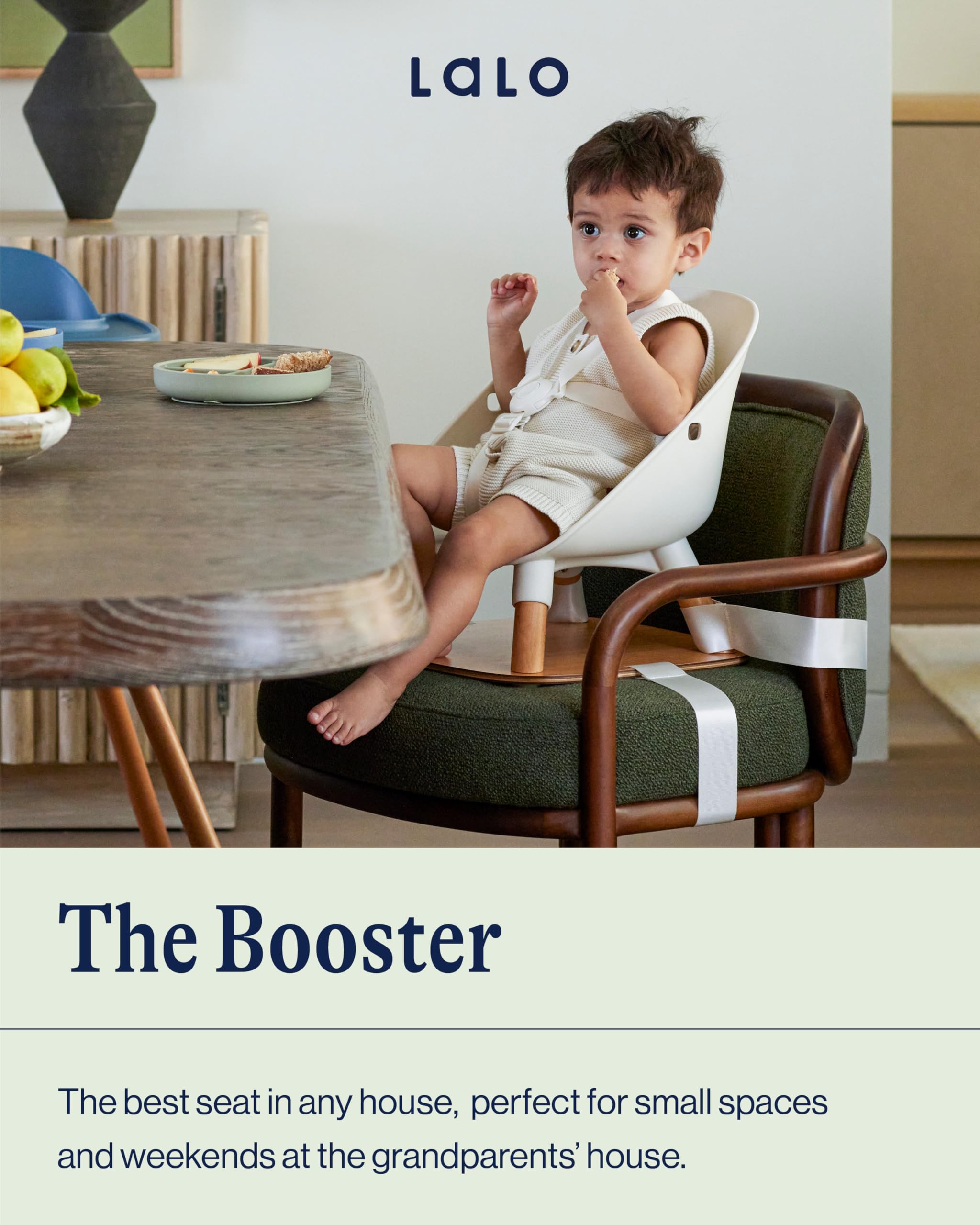 Lalo booster seat Grapefruit harness secure attachment shows five-point protection at meals.