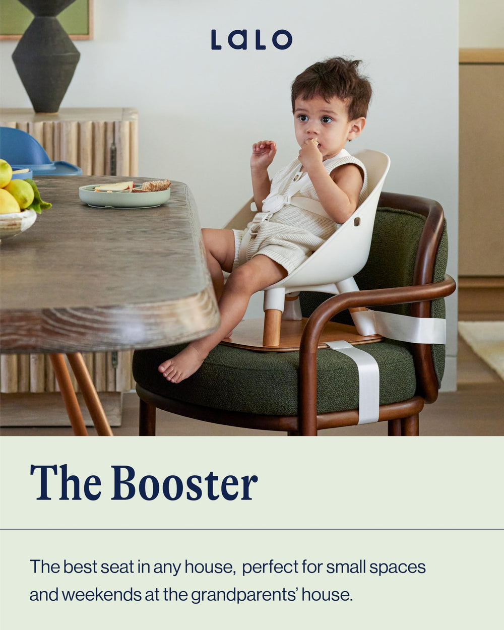 Lalo booster seat Grapefruit harness secure attachment shows five-point protection at meals.