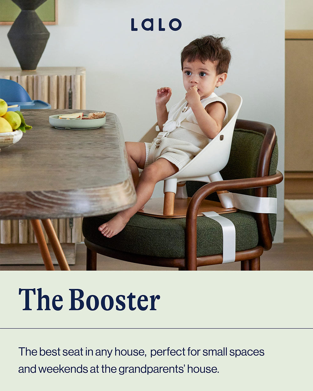Lalo Booster Seat licorice-attached-to-chair secures booster for family dining.