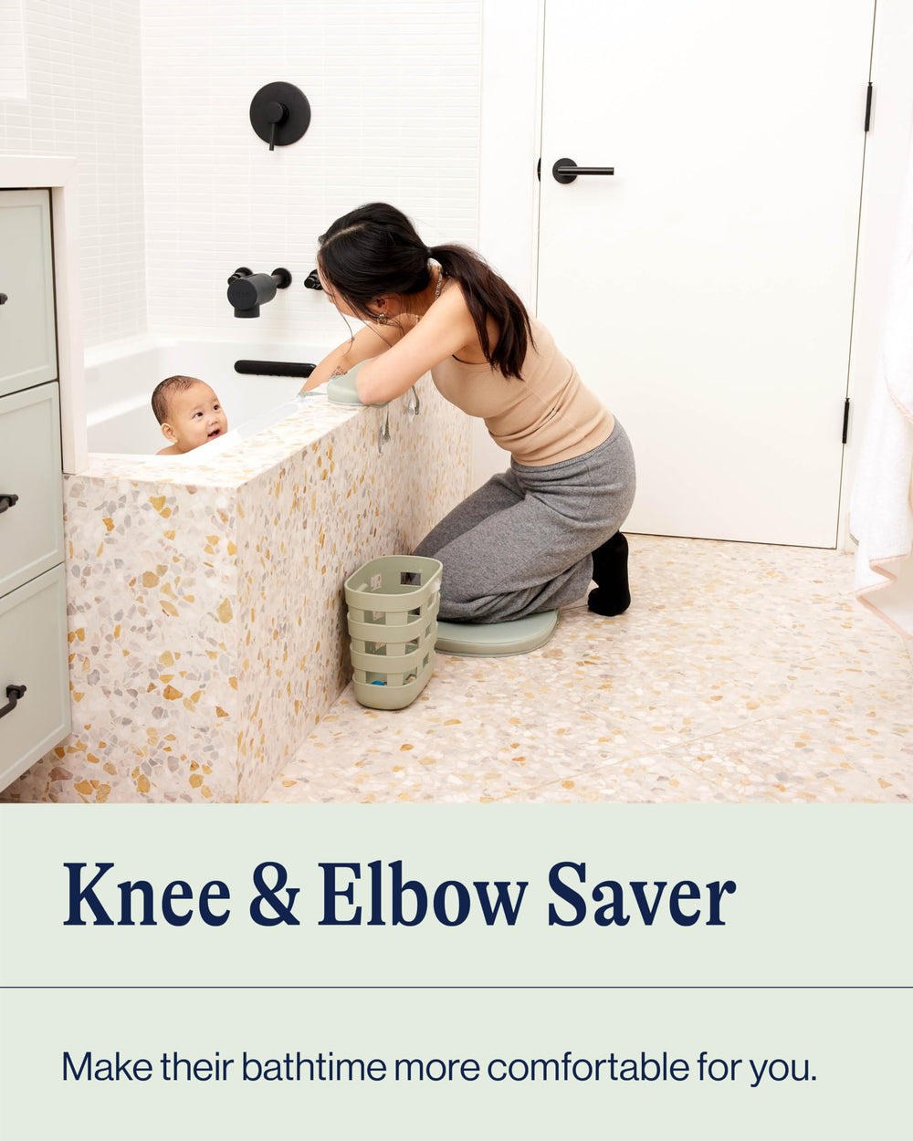 Lalo elbow rest with suction cups provides stable support during baby bath.