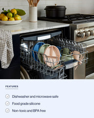 Lalo First Bites suction plate in oatmeal secured to a tray