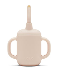 Lalo Little Cup grapefruit color close-up highlights safe silicone material for delicate gums