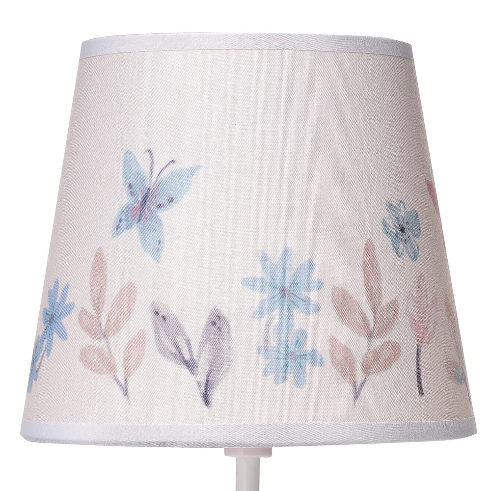 Lambs & Ivy Baby Blooms pink butterfly shade features watercolor florals for calming decor.