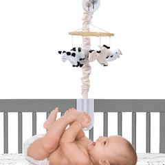 Lambs & Ivy cow plush detail highlights soft plush texture for baby comfort.