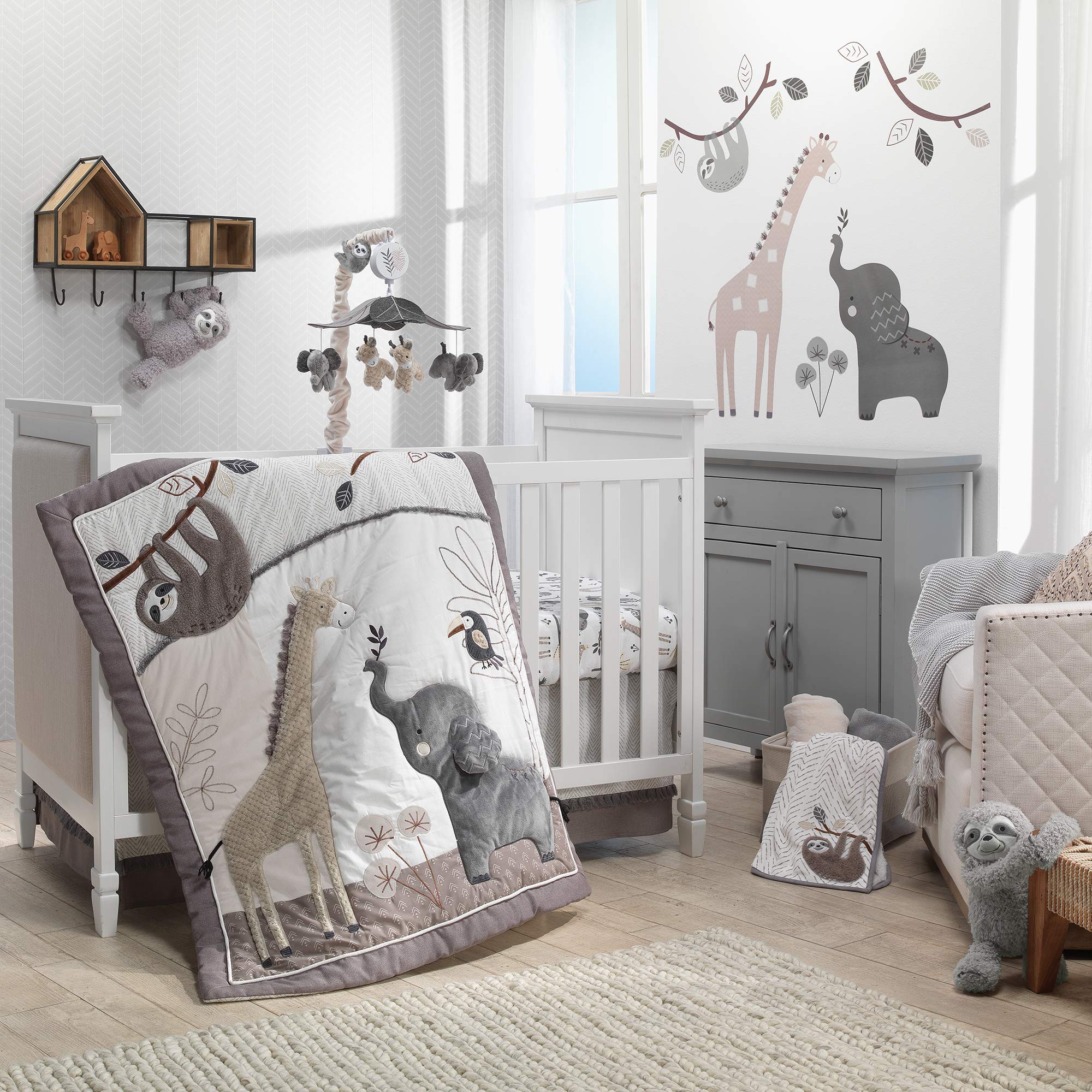 Lambs & Ivy Baby Jungle toucans print supports cohesive nursery decor.