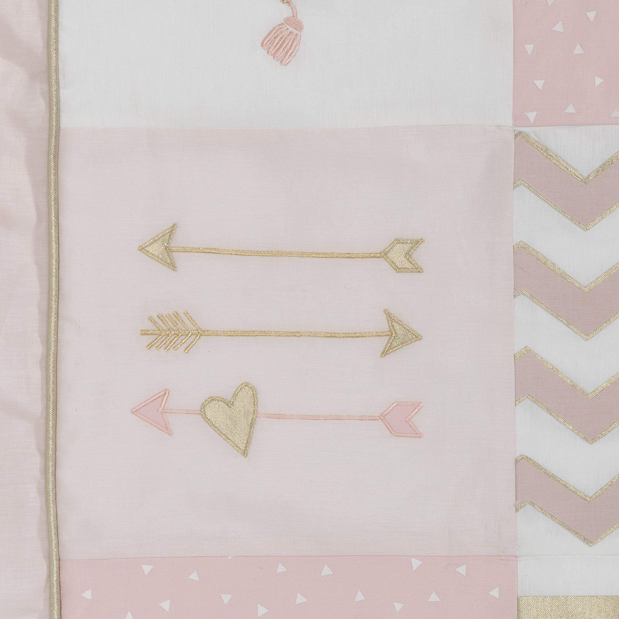 Lambs & Ivy Baby Love pink-gold diaper stacker keeps about 40 diapers neatly within reach.