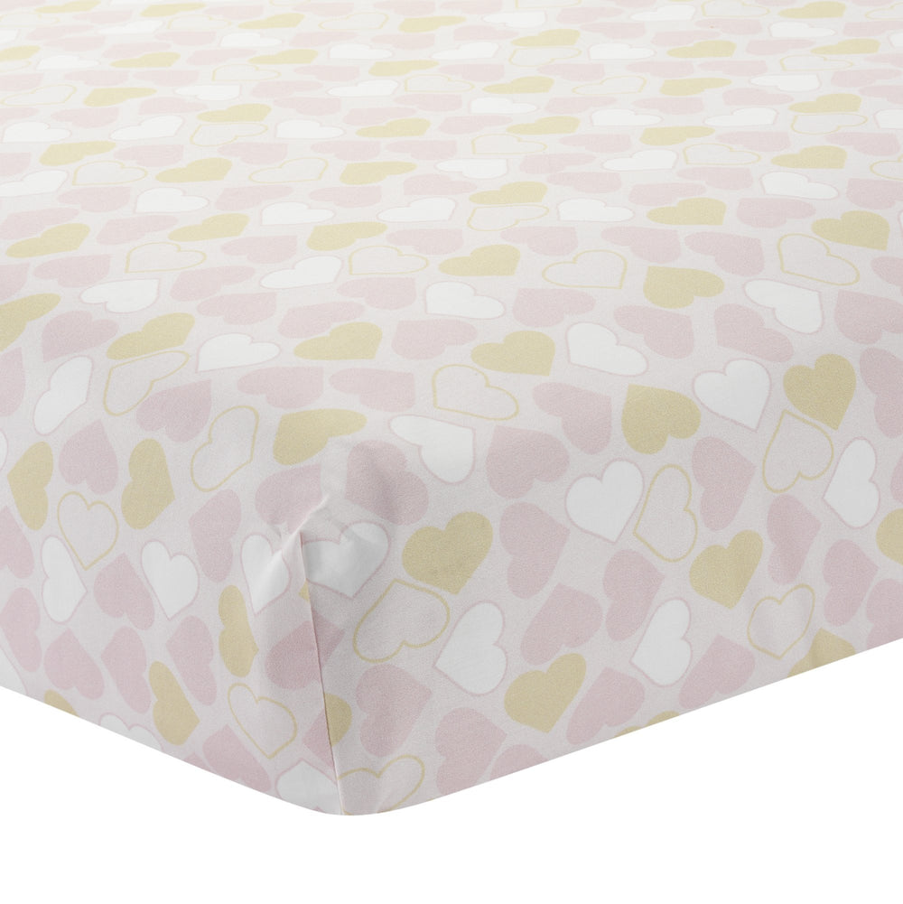 Lambs & Ivy Baby Love pink-gold heart embroidery detail adds charm to nursery decor.