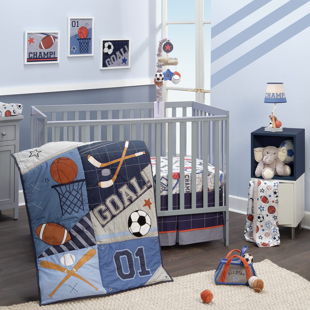 Lambs & Ivy baby sports quilt with appliques offers cozy bedtime comfort.