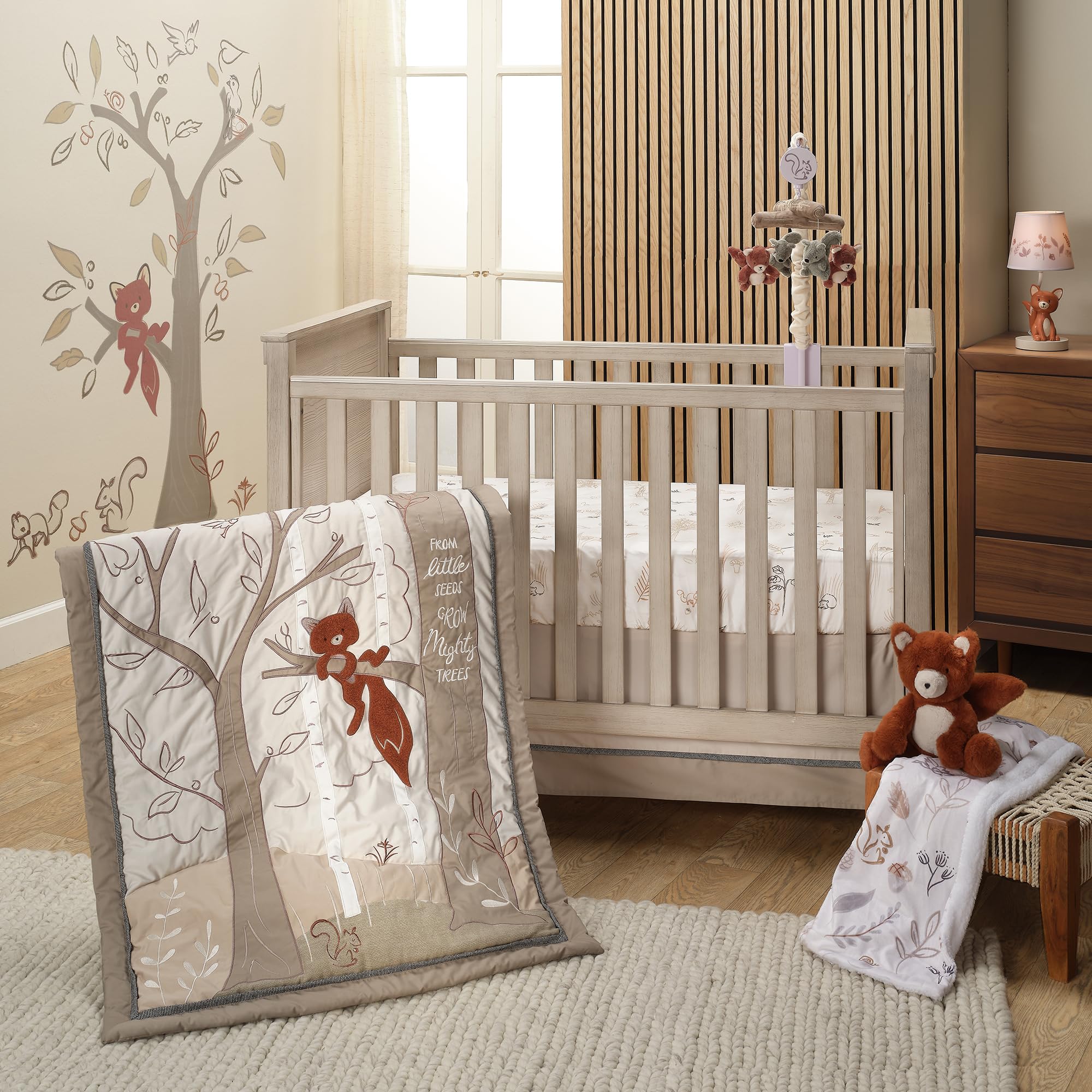 Lambs & Ivy calming forest colors promote a peaceful sleep environment.