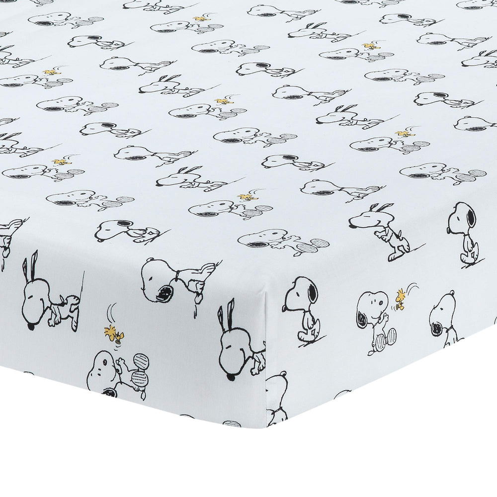 Lambs and Ivy Classic Snoopy crib sheet with Snoopy design offers a cozy breathable fit.