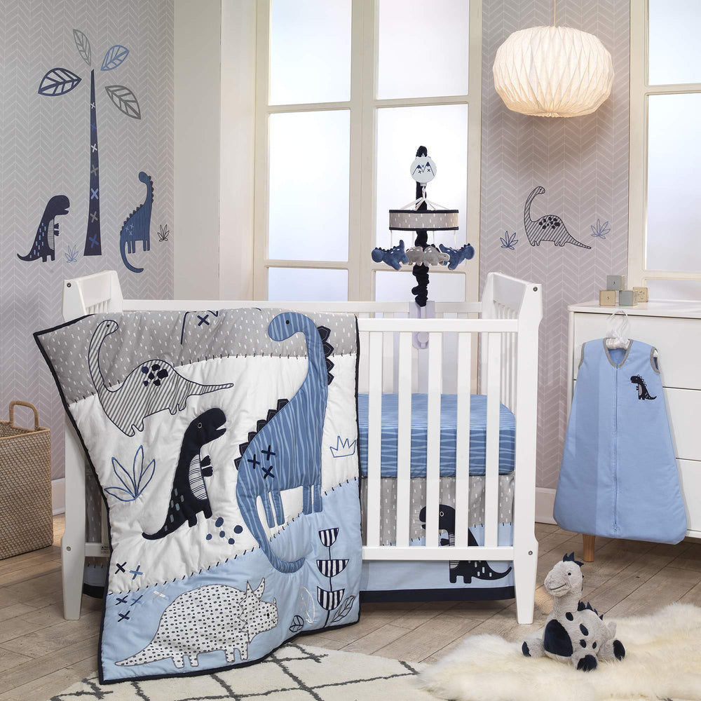 Lambs & Ivy dino mobile in nursery setting ready to entertain and soothe baby