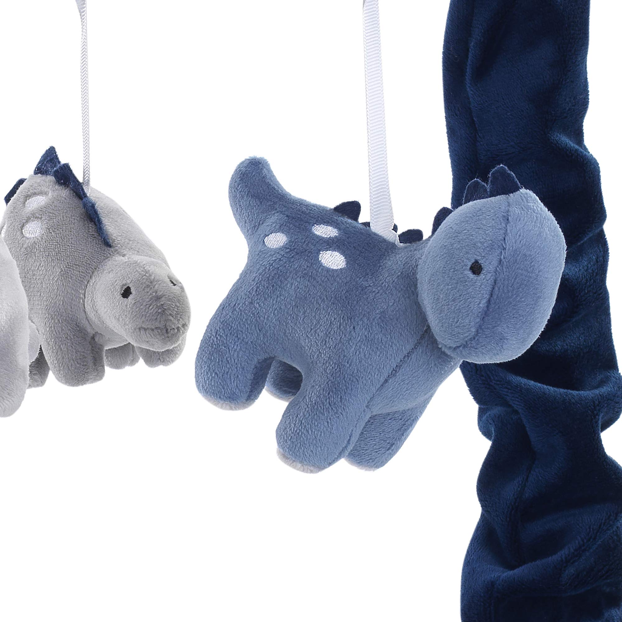 Lambs & Ivy dino mobile rotation image illustrating spinning motion for soothing baby