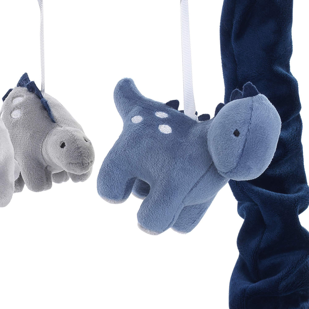 Lambs & Ivy dino mobile rotation image illustrating spinning motion for soothing baby