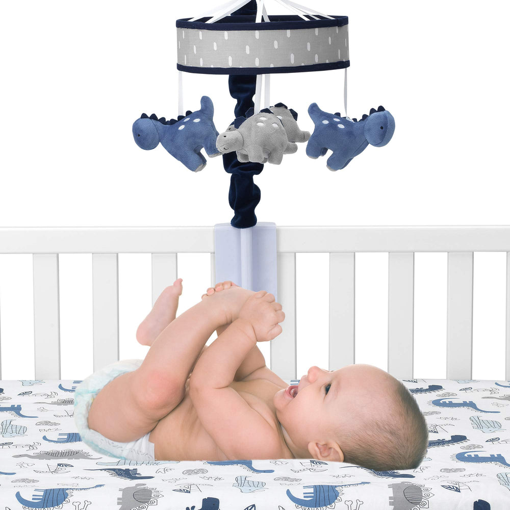 Lambs & Ivy dino mobile song mode display highlighting three classical tunes and volume control