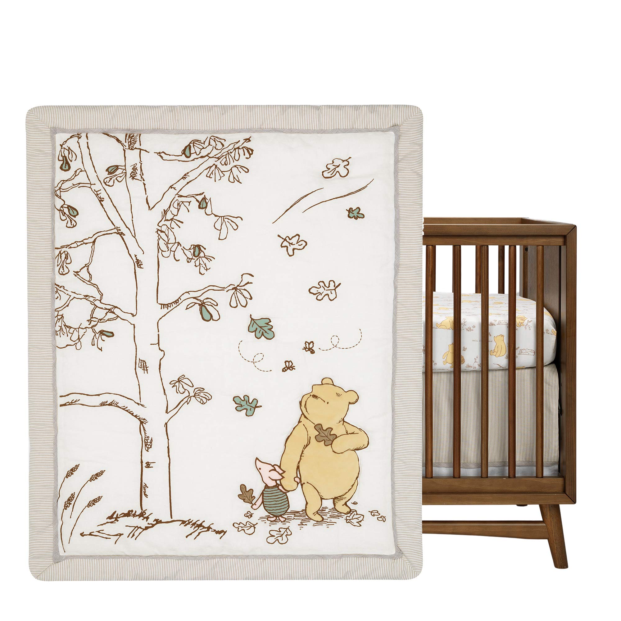 Lambs & Ivy Pooh Piglet minky appliques provide soft tactile texture during tummy time.