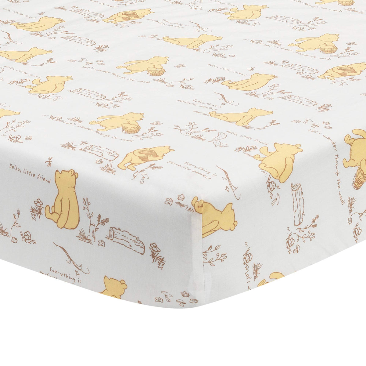 Lambs & Ivy Disney Baby Storytime Pooh sheet on crib mattress for breathable comfort.