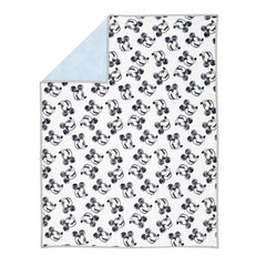 Lambs & Ivy Mickey blanket back features blue jersey for breathable comfort.