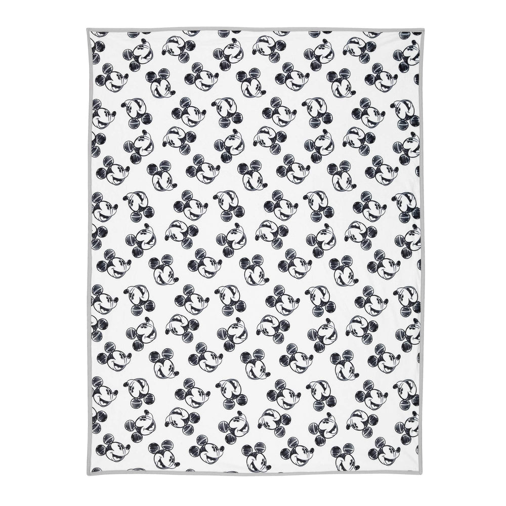 Lambs & Ivy Mickey blanket gray binding adds durable finish.