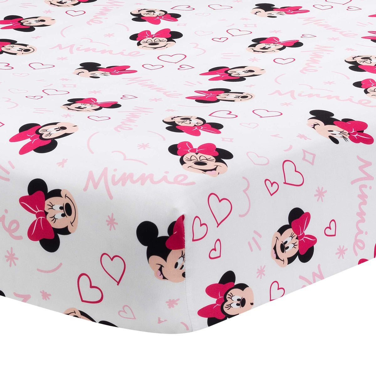 Lambs & Ivy Minnie Love crib sheet closeup showing Minnie heads and pink hearts for nursery decor.
