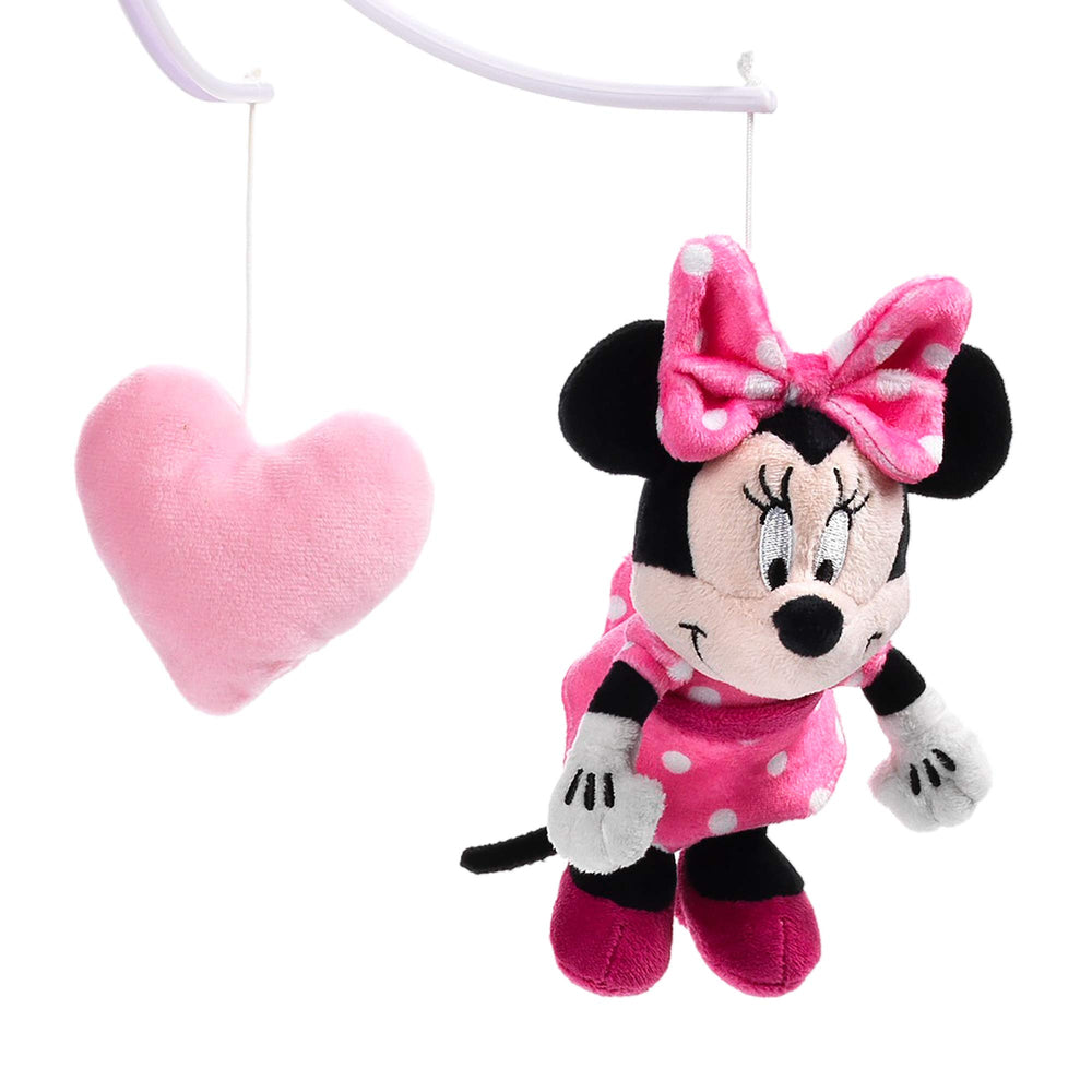 Lambs & Ivy Minnie and pink hearts detail enhances visual focus for baby.