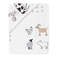 Lambs & Ivy elastic edge demonstrates secure fit on crib mattress