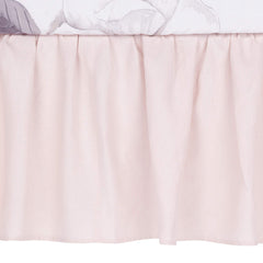 Lambs & Ivy Floral Garden pink linen crib skirt with shirred, 14.5-inch drop for a soft drape.