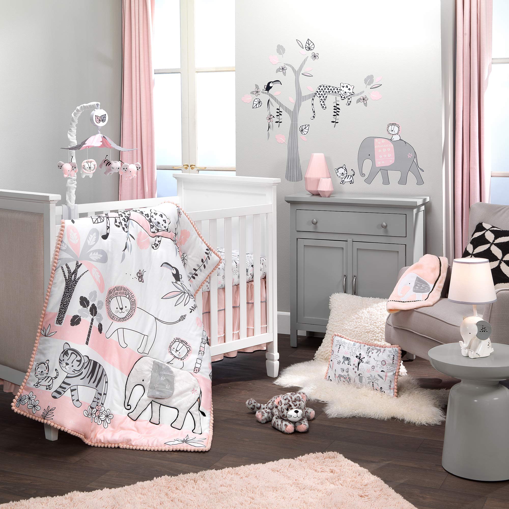 Lambs & Ivy Happy Jungle Mobile canopy and animals inspire peaceful nursery moments.
