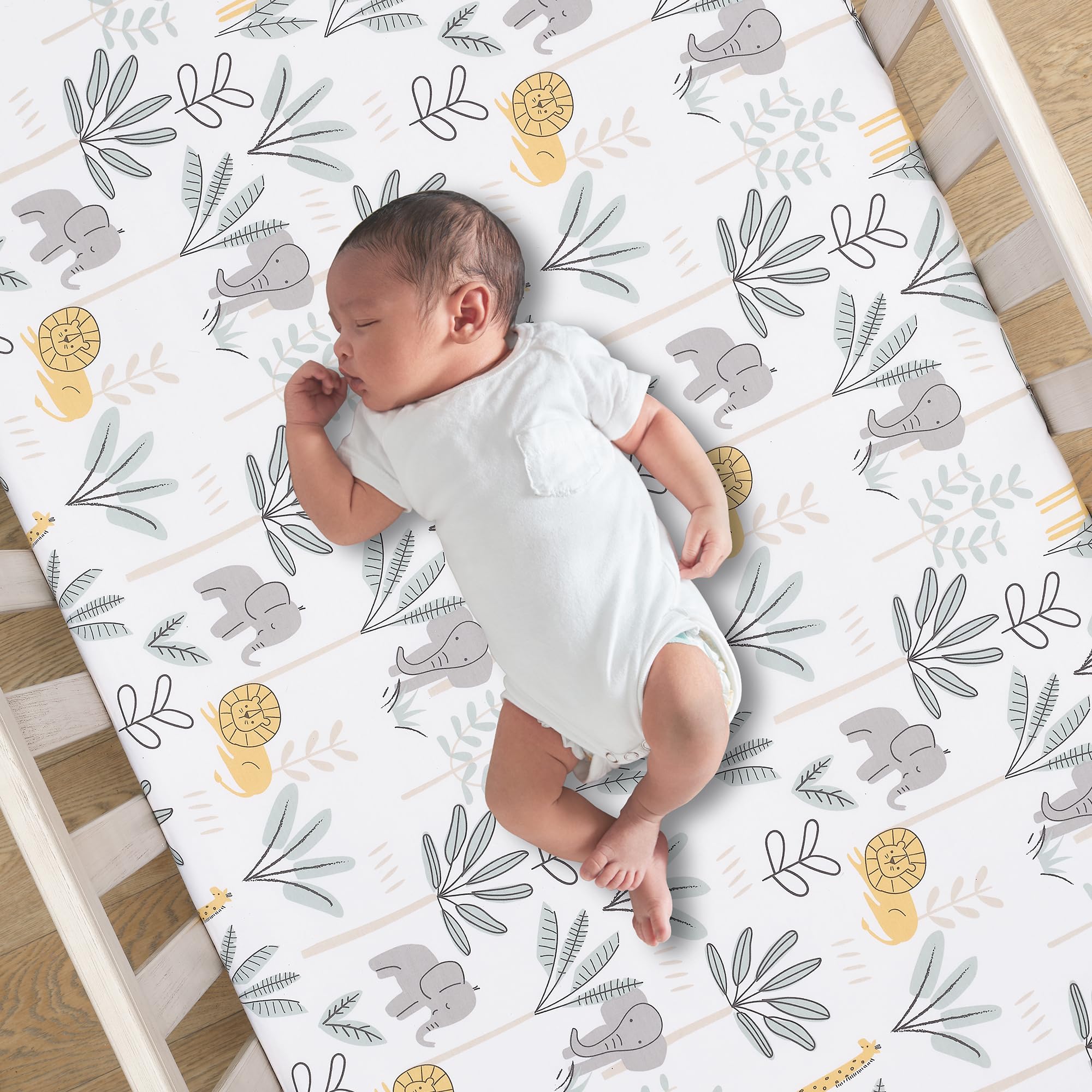Lambs & Ivy Jungle Adventure sheet full crib view with calming colors for sleep