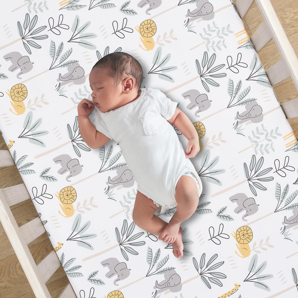 Lambs & Ivy Jungle Adventure sheet full crib view with calming colors for sleep