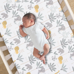 Lambs & Ivy Jungle Adventure sheet full crib view with calming colors for sleep