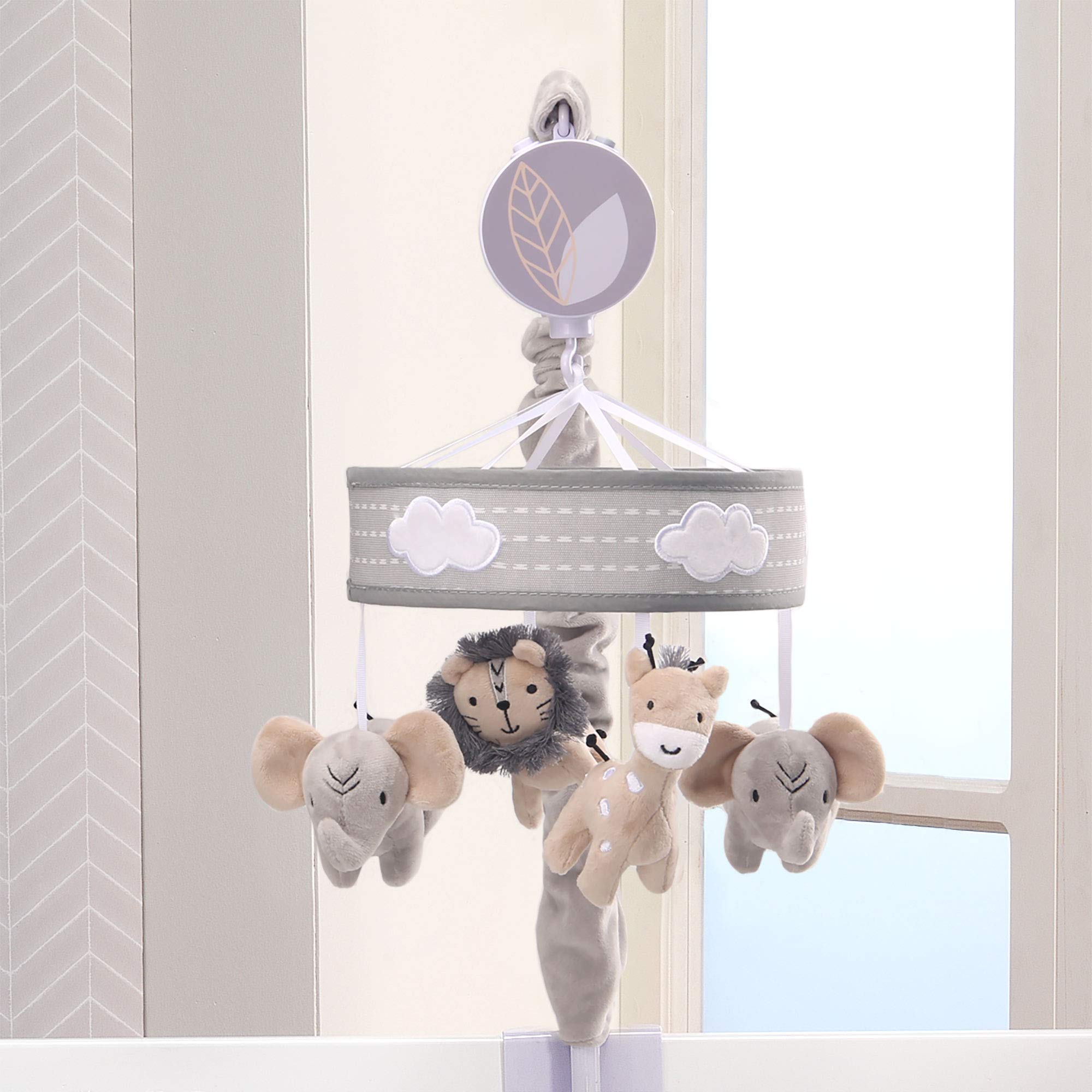 Lambs & Ivy Jungle Safari bedding coordination shown with mobile in nursery.
