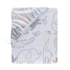 Lambs & Ivy Jungle Story crib sheet in a calm nursery setup.