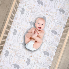 Lambs & Ivy Jungle Story crib sheet elastic edge shows snug fit for standard mattresses.