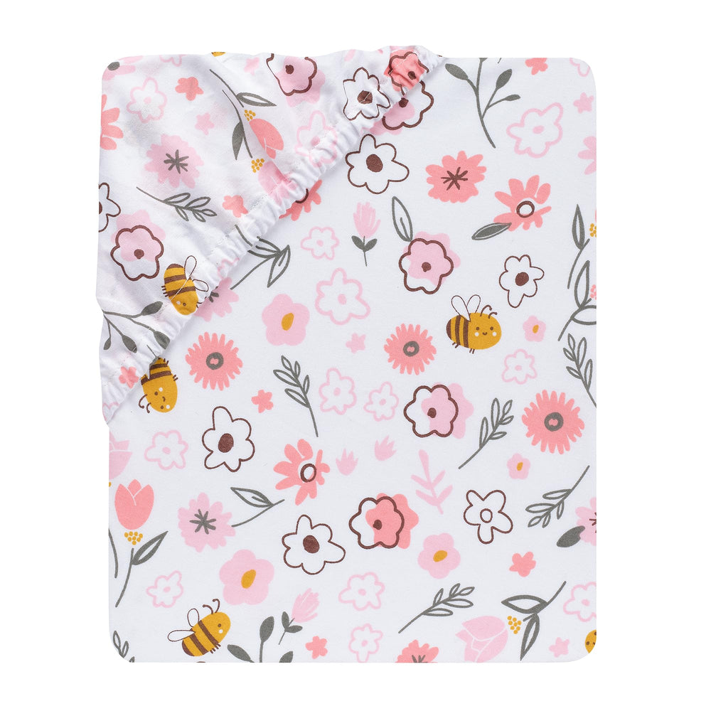 Lambs and Ivy Little Garden Sheet elastic edge close-up, provides safe, secure crib fit.