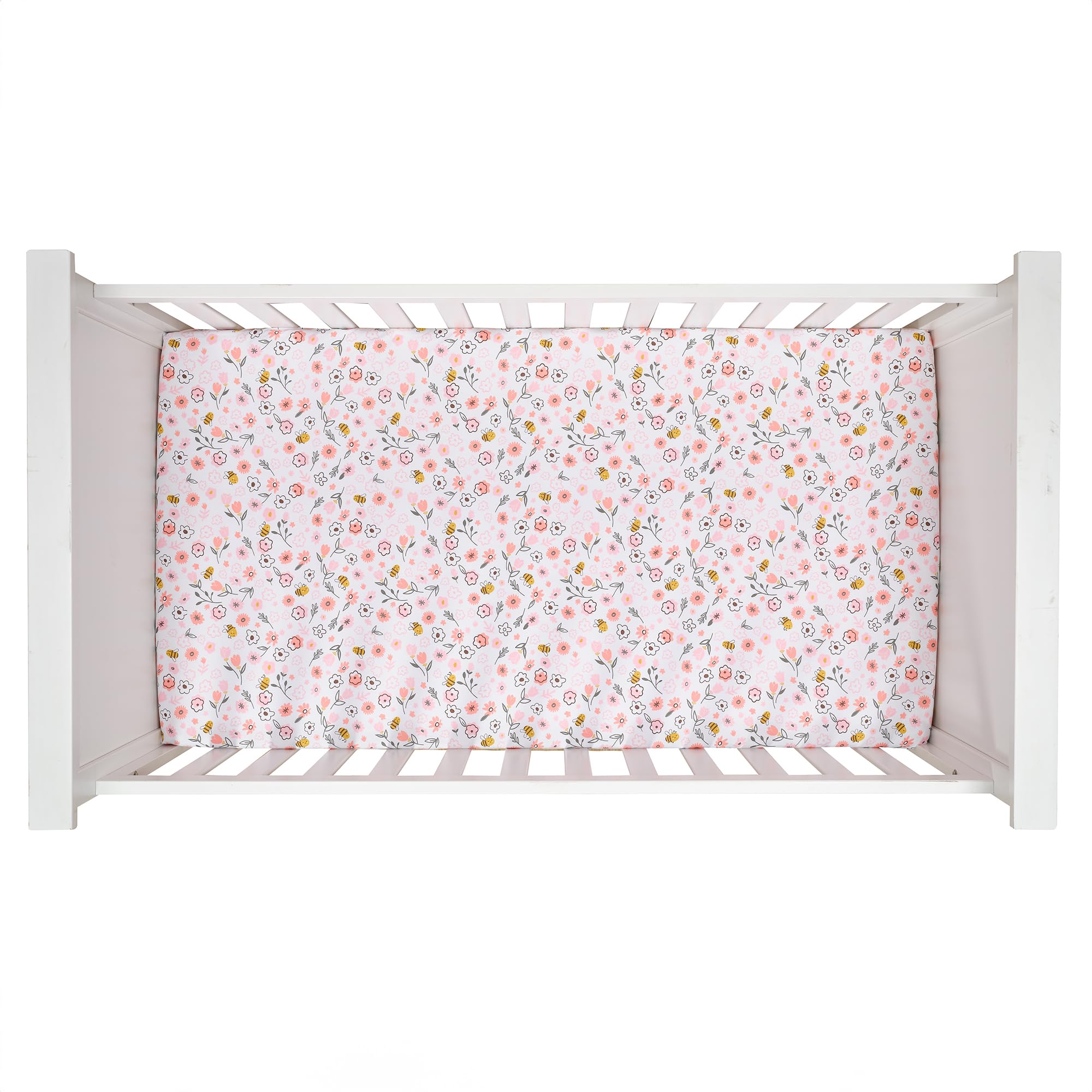 Lambs and Ivy Little Garden Sheet close-up, cotton fabric shows pastel pink flowers and delicate texture.