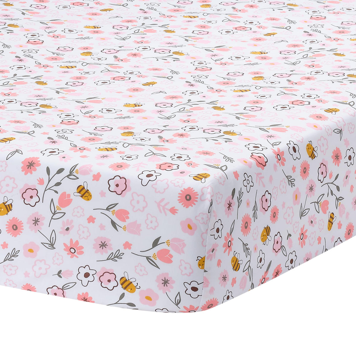 Lambs and Ivy Little Garden Sheet folded, pink floral fabric, soft breathable cotton for crib comfort.