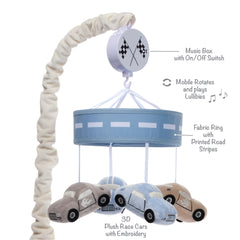 Lambs & Ivy Little Racer blue ring frames the mobile for calming bedtime visuals.