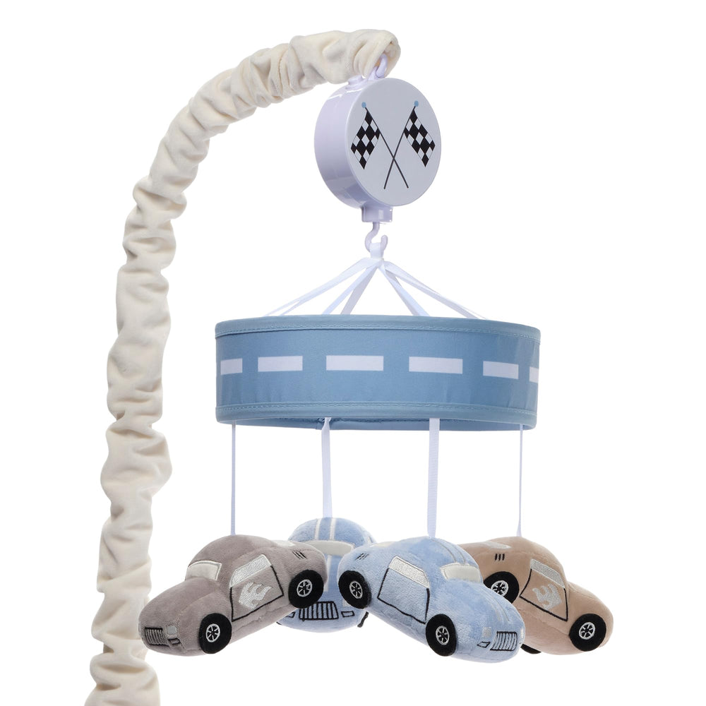 Lambs & Ivy Little Racer velour cars swirl above crib for gentle visual stimulation.