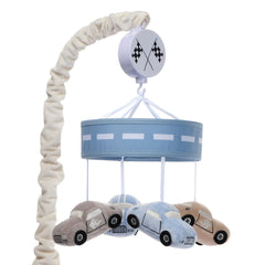 Lambs & Ivy Little Racer velour cars swirl above crib for gentle visual stimulation.