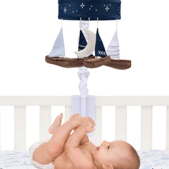 Lambs & Ivy Little Skipper crescent moon embroidery fosters calming night imagery.