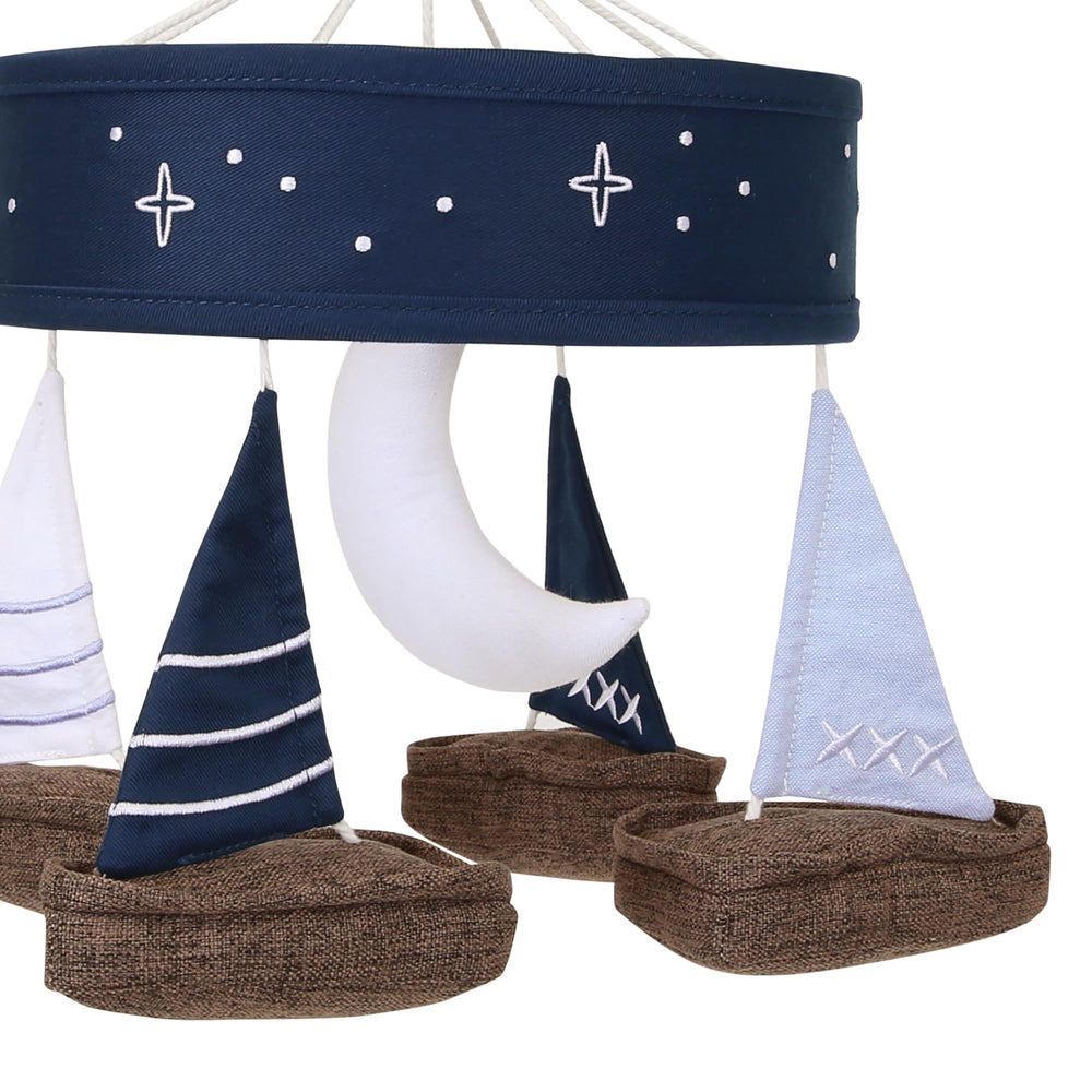 Lambs & Ivy Little Skipper musical mobile plays soothing lullabies.