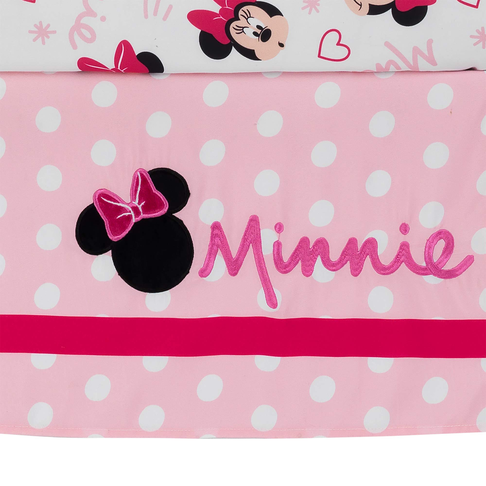 Lambs & Ivy Minnie Love hot pink bow provides playful color pop during bedtime.